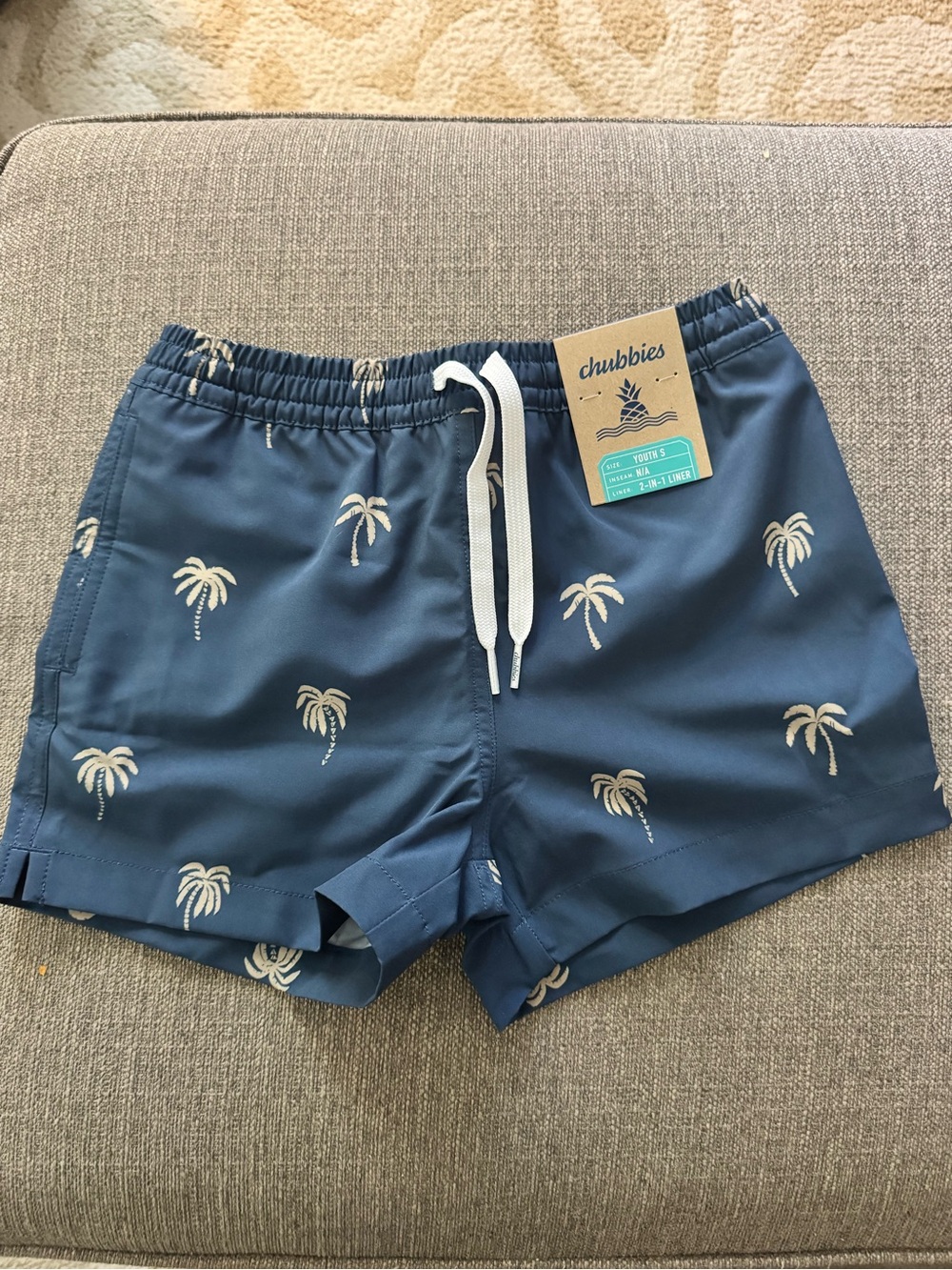 chubbies Kids Blue Swim Trunks with Cream Palm Print